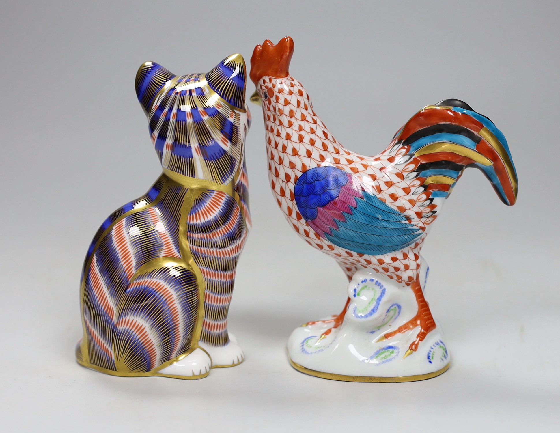 A Herend chicken and a Derby cat